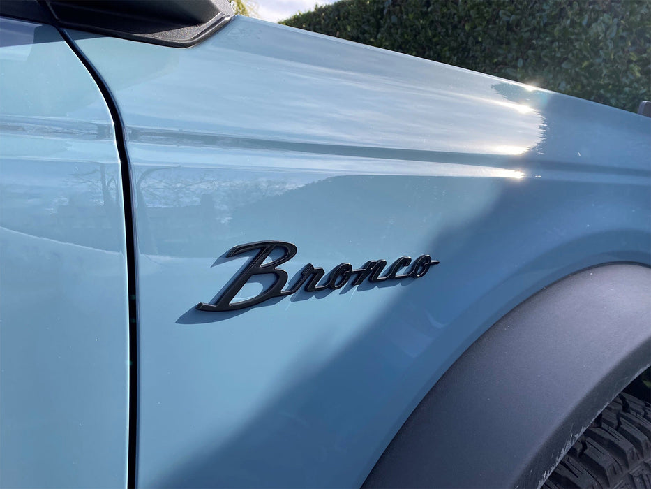2021-2024 Ford Bronco OEM M-1447-BSMB Matte Black Script Heritage Fender Emblems Pair